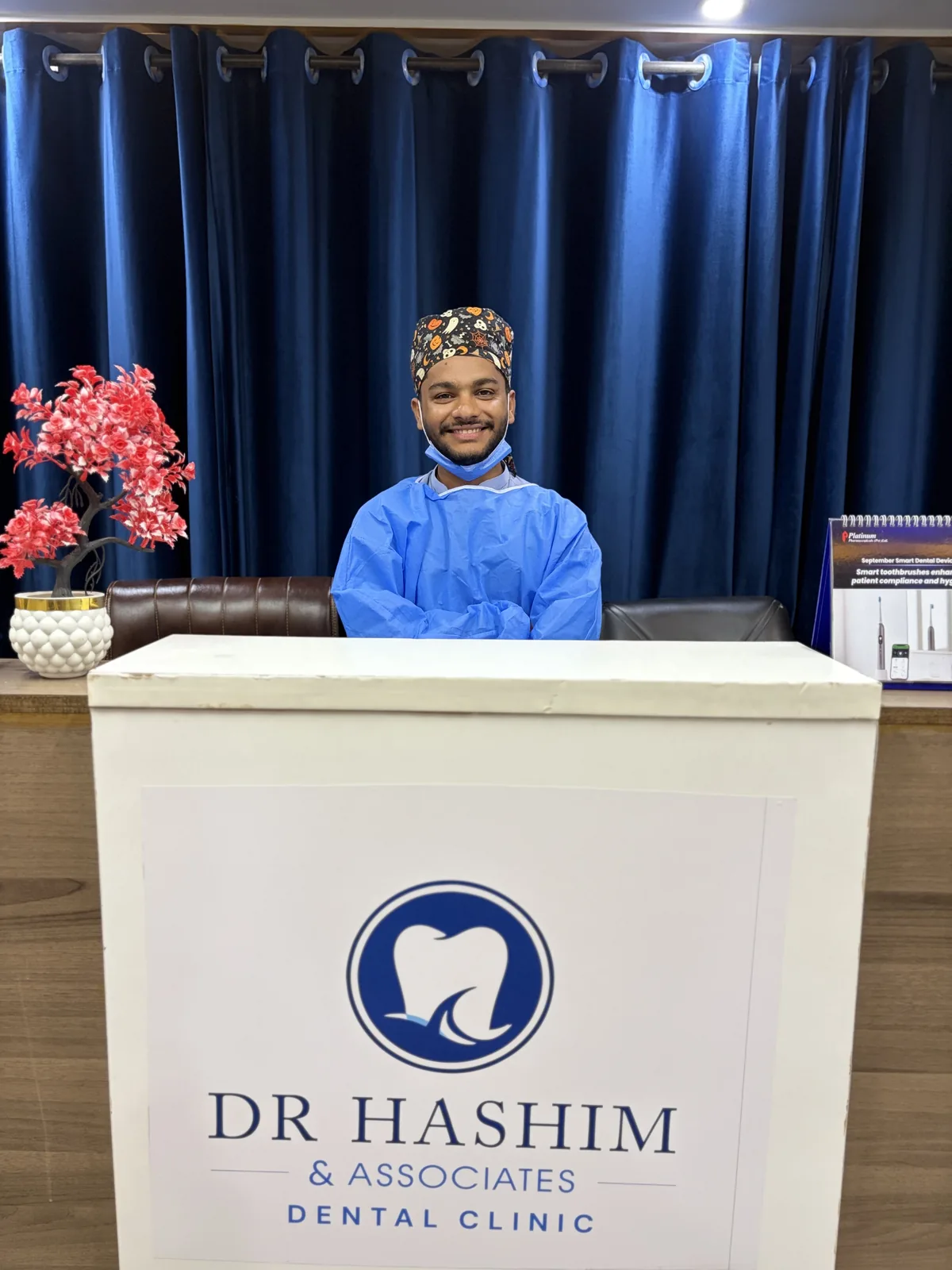 Reception desk and waiting area at Dr Hashim and Associates
